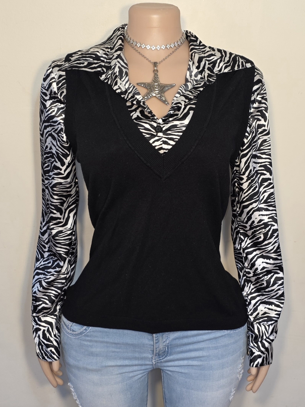 Simply Russell Black V-Neck Sweater Vest Over Zebra Print Blouse